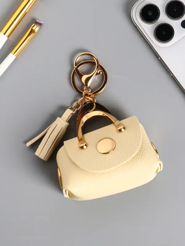 Брелок кожзам с карабином, с кистью Брелок кожзам с карабином, с кистью "Саквояж" сливочный 7,5х4х7 см