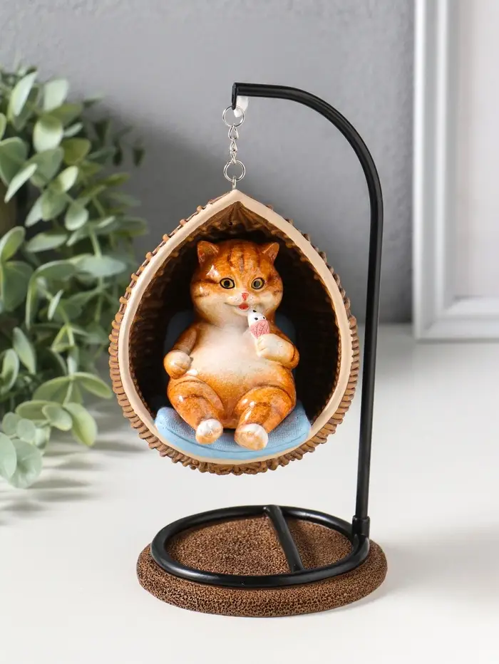 Сувенир полистоун лак "Пухлый кот ест мороженое, в кресле-качеле" 11,5х10,5х18 см