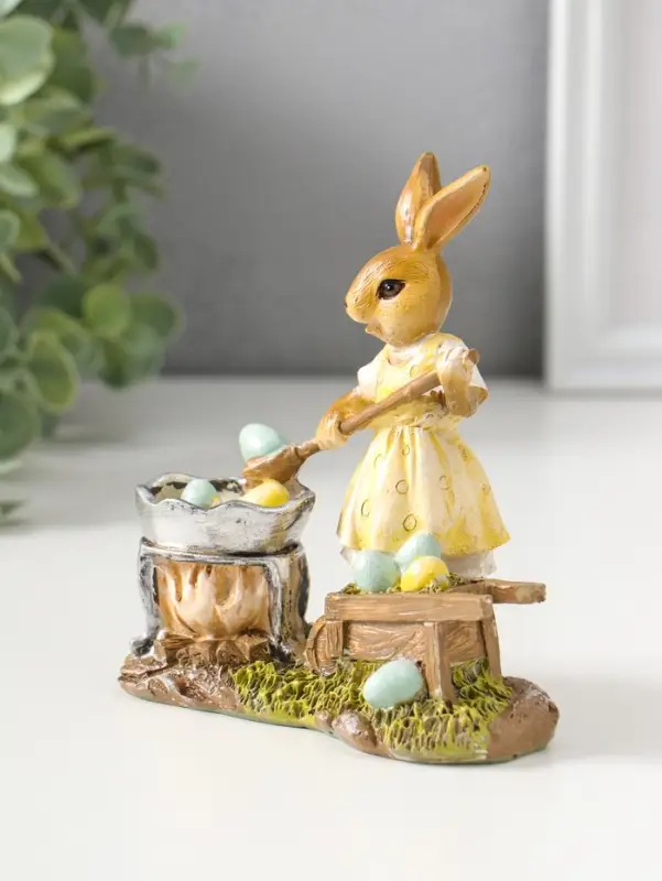 Сувенир полистоун "Зайка в жёлтом платье, красит пасхальные яички" 12,5 см