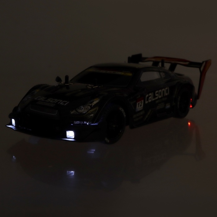 Машинка на пульте управления «Огненный Дрифт», радиоуправление, дрифт эффект, сменные колеса, работает от аккумулятора, цвет чёрный Машинка на пульте управления «Огненный Дрифт», радиоуправление, дрифт эффект, сменные колеса, работает от аккумулятора, цвет чёрный