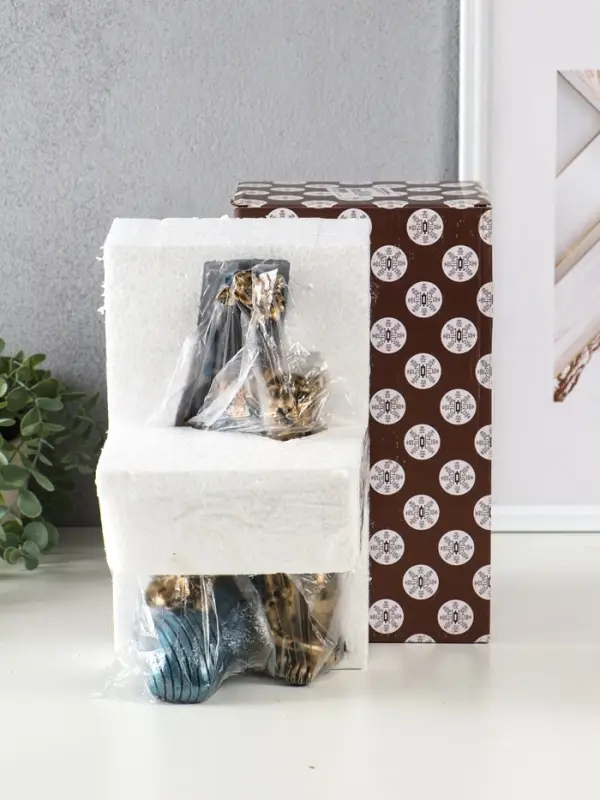 Сувенир полистоун  Сувенир полистоун "Африканка в платье с леопардом" бензиновый синий 13х13х25,5 см