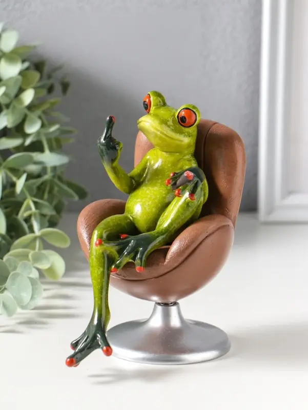 Сувенир полистоун лак "Лягуха показывает средний палец, в кресле" крутится 13х8,7х14 см