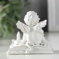 Сувенир полистоун "Ангелок с лупой на книге" белый 7,7х5х7 см Сувенир полистоун "Ангелок с лупой на книге" белый 7,7х5х7 см