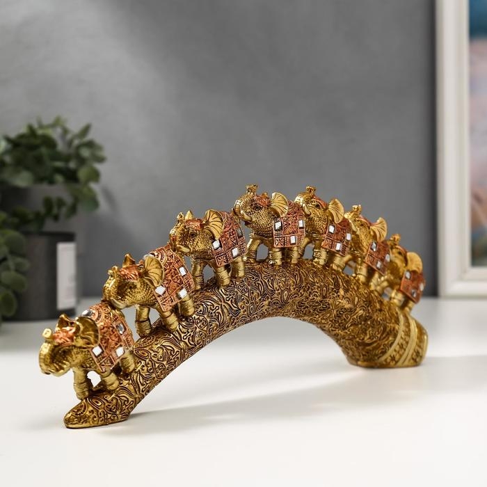 Сувенир полистоун Сувенир полистоун "Семь бронзовых слонов с попоной из арабского ковра на роге" 11,5х31х5 см