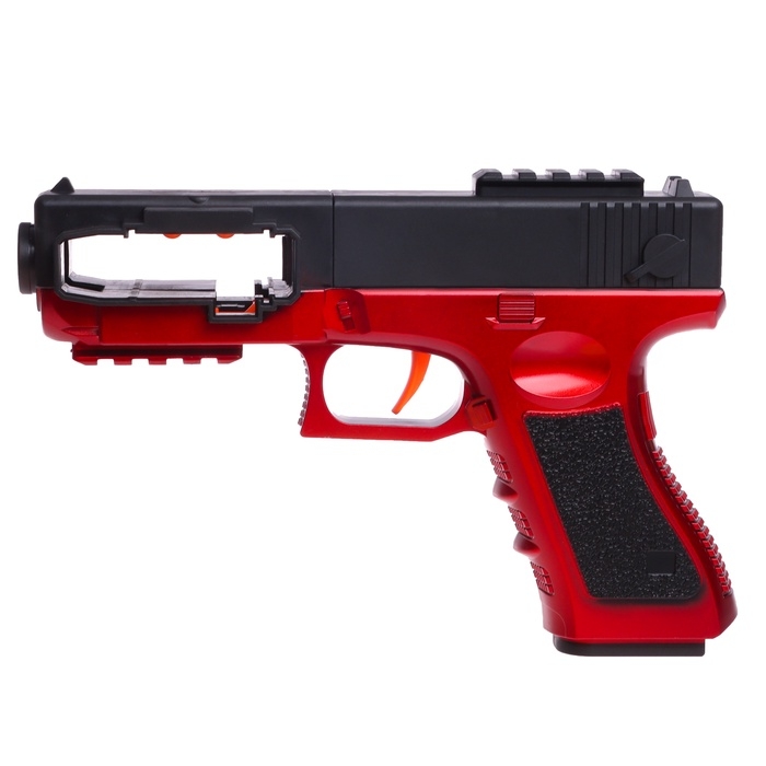 Пистолет «Глок», стреляет мягкими пулями, ленточная подача Пистолет «Глок», стреляет мягкими пулями, ленточная подача