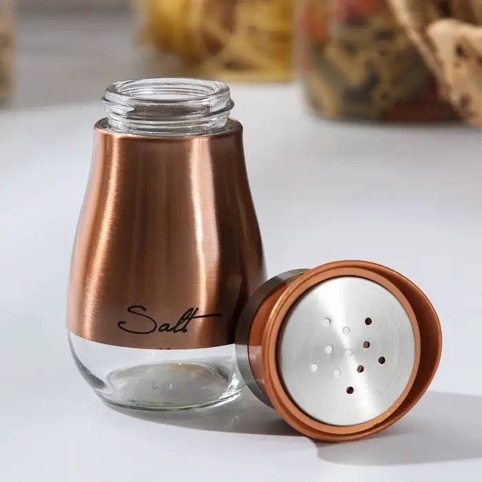 Солонка стеклянная «Сияние», 5,5×5×11 см, цвет бронзовый, надписи МИКС Солонка стеклянная «Сияние», 5,5×5×11 см, цвет бронзовый, надписи МИКС