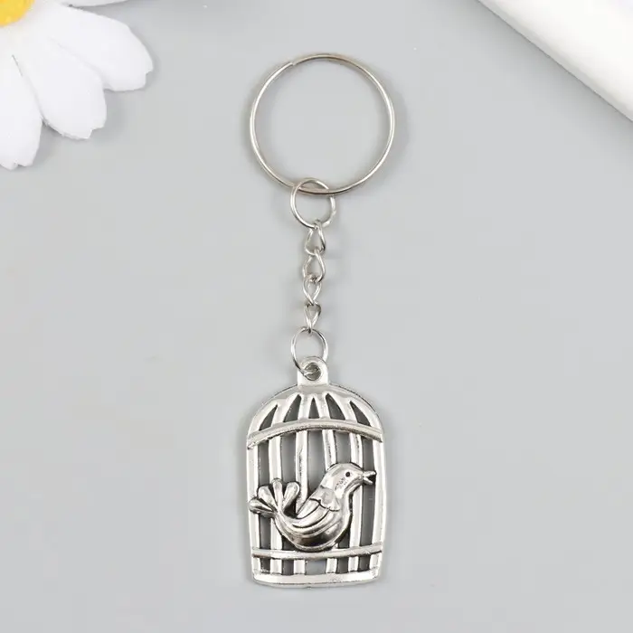 Брелок металл "Птица у клетки" серебро 2,2х3,6 см
