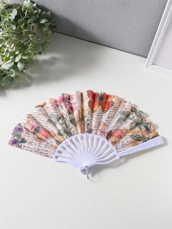 Веер складной &laquo;Бабочки, цветы и старые газеты&raquo;, 22.5 см