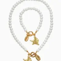 Набор 2 пред-та: бусы.браслет "Жемчуг", ракушка, цвет белый в золоте L=18/42см №8