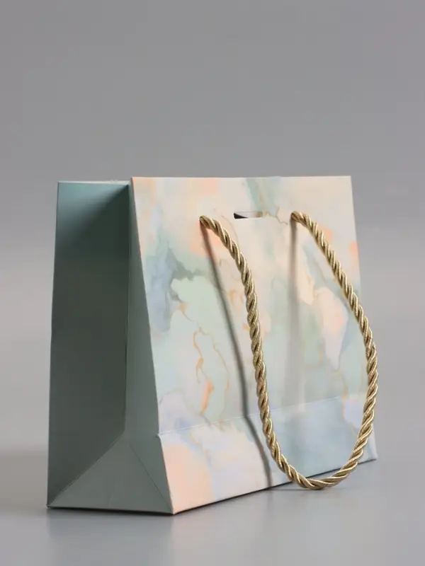 Пакет подарочный "Мрамор" , голубой , с бантиком , 19 х 15 х 7 см