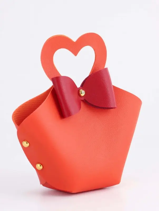 Кожанная подарочная сумочка 10,5 х 5 х 6 см оранжевая Кожанная подарочная сумочка 10,5 х 5 х 6 см оранжевая