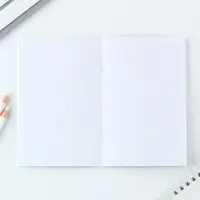 Блокнот А6, 32 л на скрепке, в клетку «Девочка с косичками»