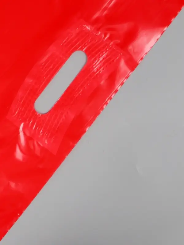 Пакет с вырубной усиленной ручкой ПВД 40х50 45 мкм Красный