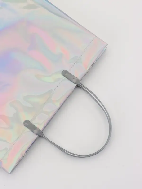 Пакет подарочный ПВХ, голография, серебро, пластиковая ручка, 26×22.5×10 см Пакет подарочный ПВХ, голография, серебро, пластиковая ручка, 26×22.5×10 см