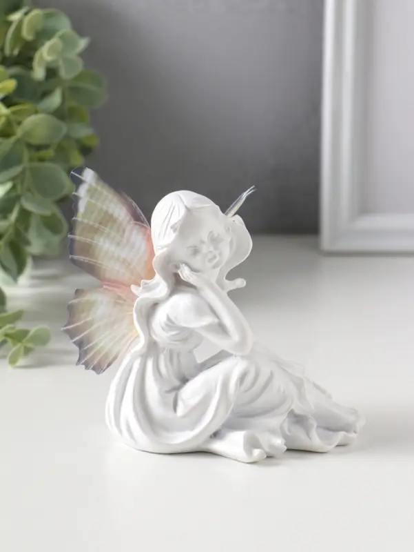 Сувенир полистоун "Девочка-бабочка" белый 6,5х10х9,7 см