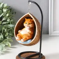 Сувенир полистоун лак "Пухлый кот ест мороженое, в кресле-качеле" 11,5х10,5х18 см