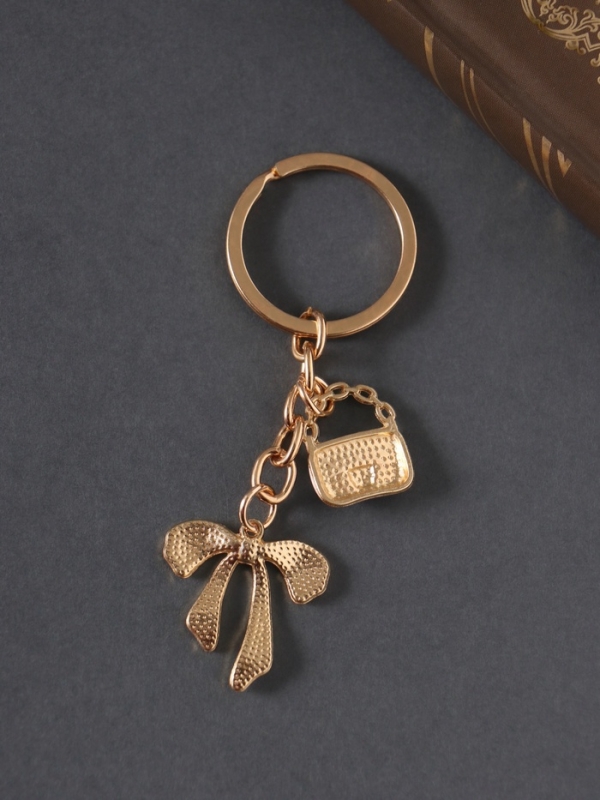 Брелок металл, эмаль "Сумочка и бант" белый 9 см