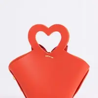 Кожанная подарочная сумочка 10,5 х 5 х 6 см оранжевая