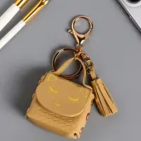 Брелок кожзам с карабином, с кистью "Сумочка. Котик" сливочный 5х2,5х6 см Брелок кожзам с карабином, с кистью "Сумочка. Котик" сливочный 5х2,5х6 см