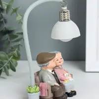 Фигурка светящаяся полистоун «Бабуля с дедулей на диванчике», 10×6×18 см