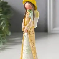 Сувенир полистоун "Малышка-ангел в желтой накидке и шляпке" 6х4,2х17 см