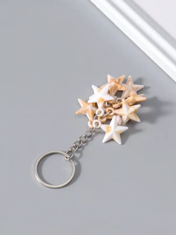 Брелок пластик "Звёзды" под песочный мрамор 9 шт 2х2,5х7 см