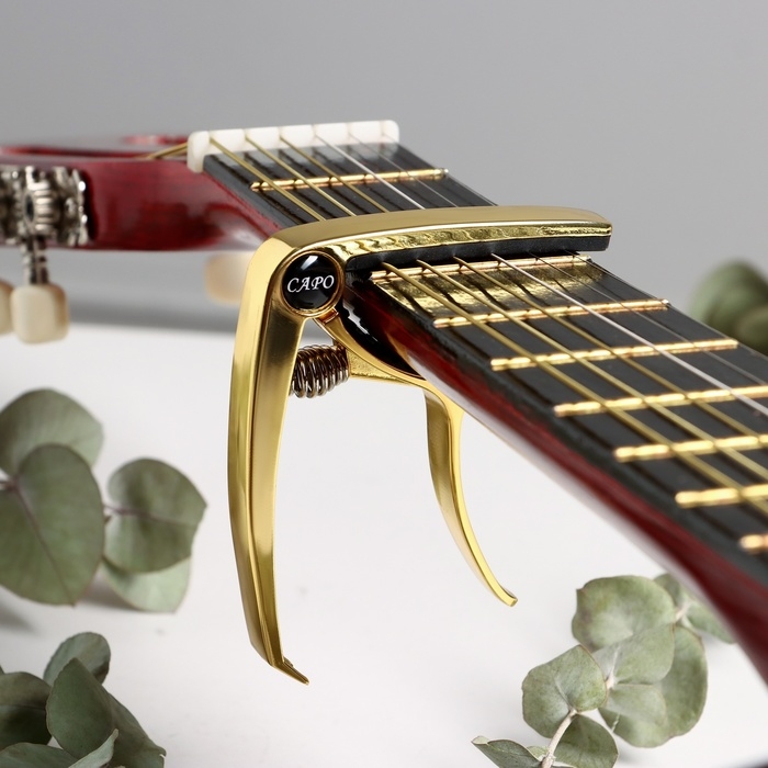 Каподастр гитарный, золотой Каподастр гитарный, золотой