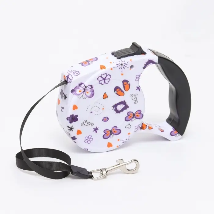 Рулетка с поводком-лентой, резиновая ручка, 5 м, вес животного до 15 кг, узоры на белом