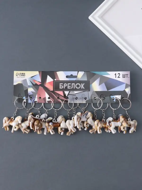 Брелок пластик под мрамор Брелок пластик под мрамор "Лошадка" 3,7х4х1 см