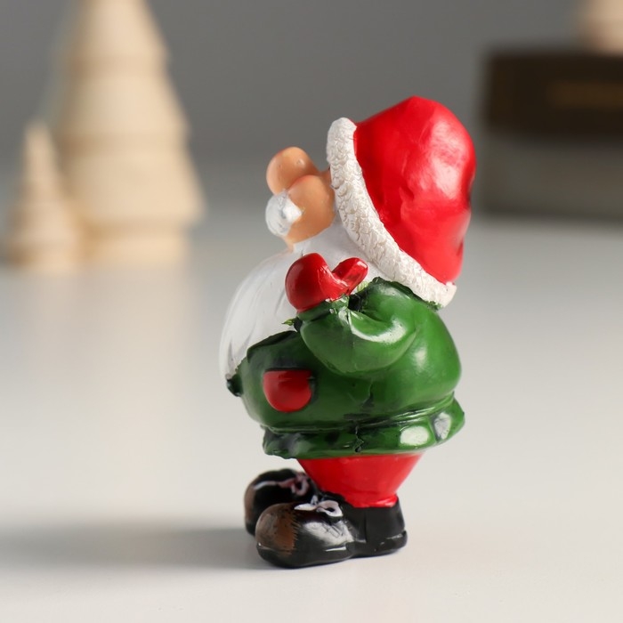 Сувенир полистоун  Сувенир полистоун "Дед Мороз в зелёном кафтане в колпаке, весельчак" МИКС 6х4х7,8 см