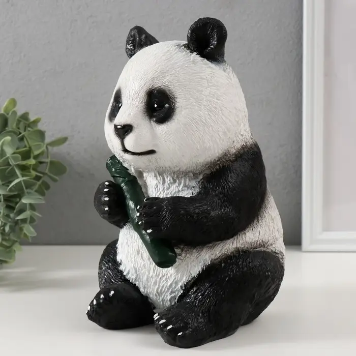 Копилка Копилка "Панда жующая " высота 23 см, ширина 16 см, длина 14,5 см.