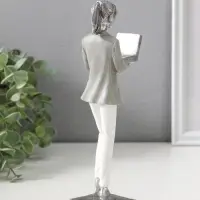 Сувенир полистоун "Девушка в бело-сером костюме с компьютером в наушниках" 24 см