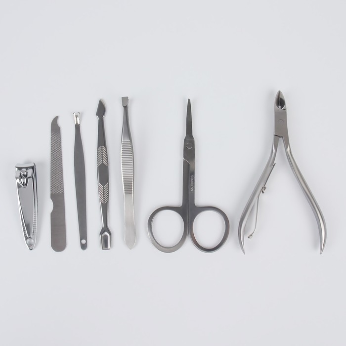 Набор маникюрный, 7 предметов, в футляре, рисунок серый/золотистый Набор маникюрный, 7 предметов, в футляре, рисунок серый/золотистый