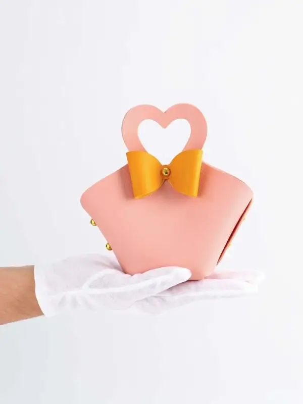 Кожаная подарочная сумочка для бижутерии и сувениров, розовая с бантом, 10.5&times;5&times;6 см