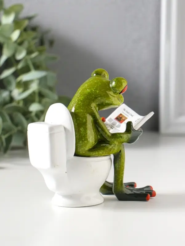 Сувенир полистоун лак "Лягушонок на унитазе с журналом" 10,5х6х10,5 см