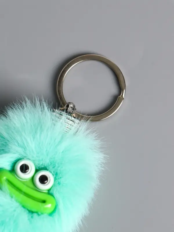 Пушистик на кольце "Чудик" мятный 19х4х4 см