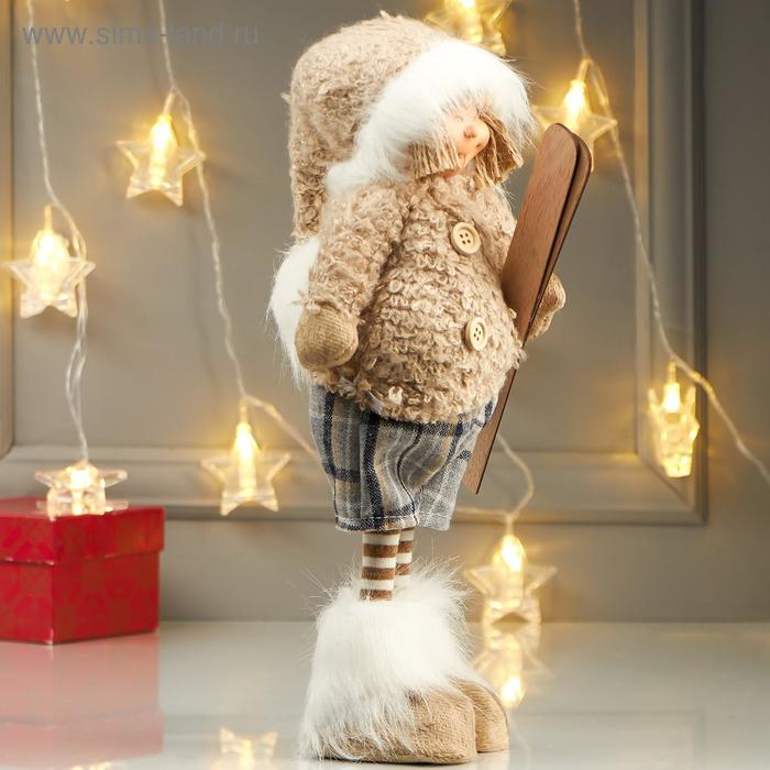 Кукла интерьерная Кукла интерьерная "Мальчик в бежевой меховой куртке, с лыжами в руке" 47х12х15