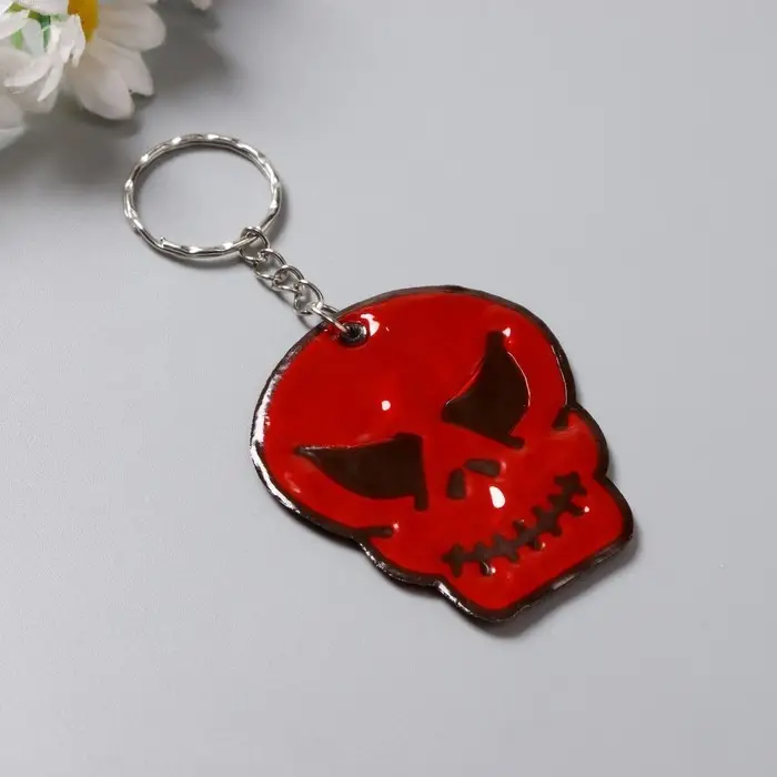 Брелок пластик светоотражающий  Брелок пластик светоотражающий "Череп" МИКС 5,5х5 см