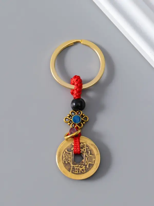 Брелок металл нэцке "5 китайских монет" 0,3х2,5х8 см