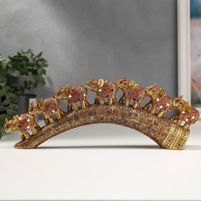 Сувенир полистоун Сувенир полистоун "Семь бронзовых слонов с попоной из арабского ковра на роге" 11,5х31х5 см