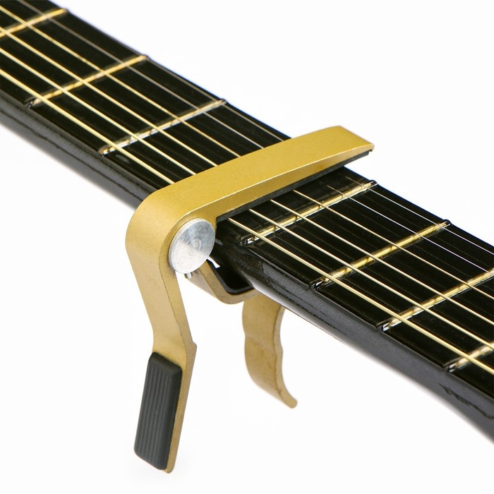 Каподастр гитарный Music life, золотой Каподастр гитарный Music life, золотой
