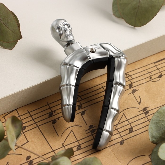 Каподастр для гитары  Каподастр для гитары "Череп" Music Life, серебристый