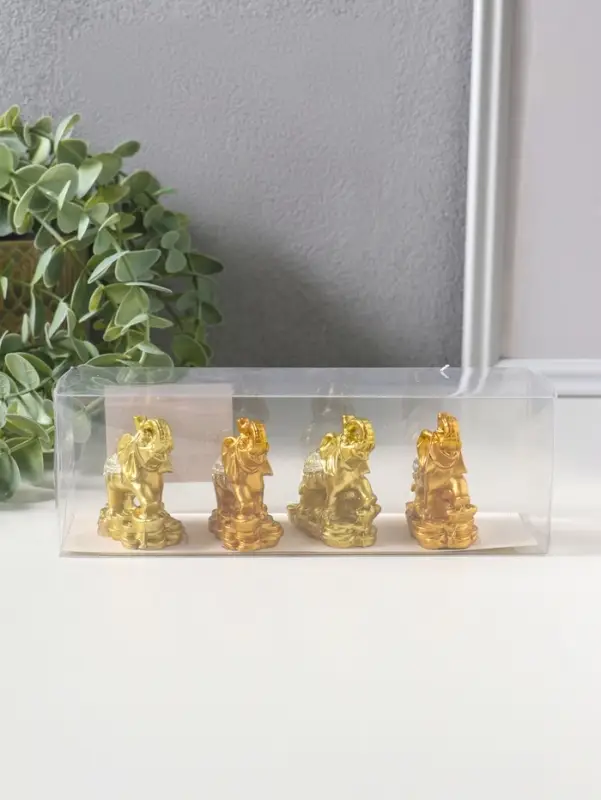Сувенир полистоун "Слон на монетах и слитках" набор 4 шт золото 2,5х5х5 см