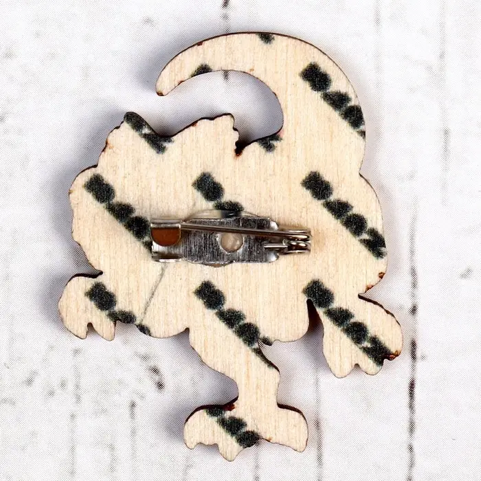 Деревянный значок «Тираннозавр» Деревянный значок «Тираннозавр»