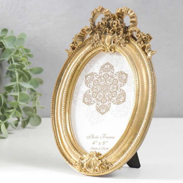 Фоторамка полистоун 10х15 см Фоторамка полистоун 10х15 см "Бант и медальон" состаренное золото 21х14 см