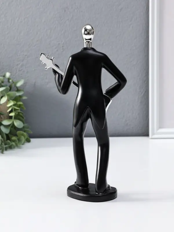 Сувенир полистоун "Гитарист" чёрный с серебром 6,5х15,2х27,5 см