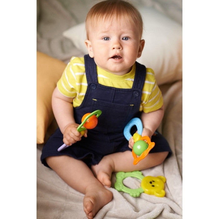 Погремушка - прорезыватель «Планеты», эластичная ручка, виды и цвет МИКС Погремушка - прорезыватель «Планеты», эластичная ручка, виды и цвет МИКС