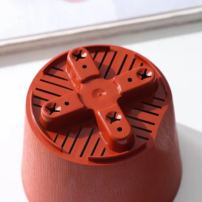 Горшок для цветов с прикорневым поливом «Альянс», 0.4 л, d=10 см, h=8.5 см, пластиковый, цвет терракот Горшок для цветов с прикорневым поливом «Альянс», 0.4 л, d=10 см, h=8.5 см, пластиковый, цвет терракот