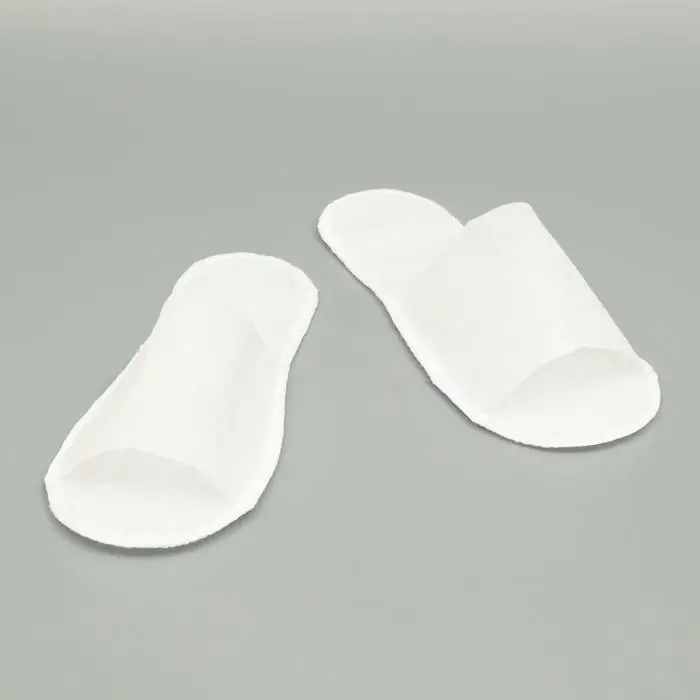 Одноразовые тапочки, эконом, белые, 42 р. Одноразовые тапочки, эконом, белые, 42 р.