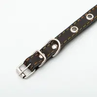 Ошейник кожаный однослойный с рифлеными люверсами, безразмерный, 40&times;1.5 см, ОШ 27-35 см, чёрный